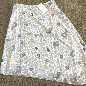 Brand new Ted Baker asymmetrical light leopard print skirt with spring colors.